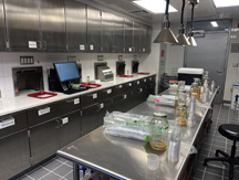 Food science laboratory stainless steel table set up for tree sap tasting trial.